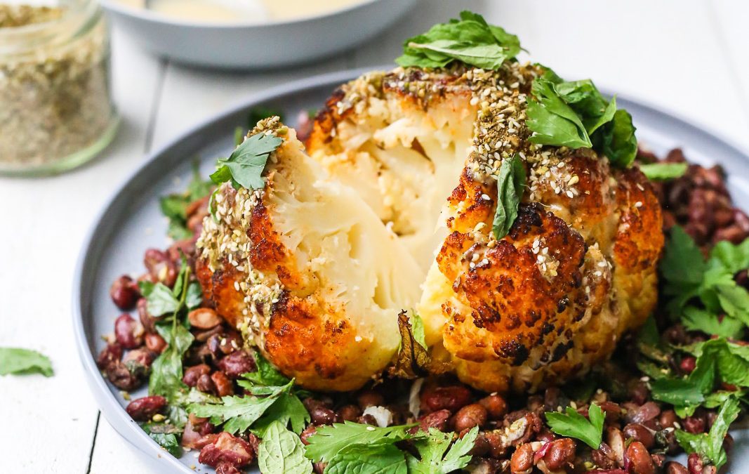 Golden baked cauliflower with crispy herby beans